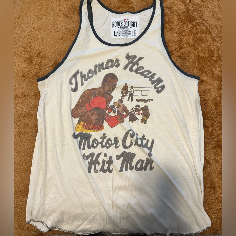 Roots of fight barely worn tank top size large